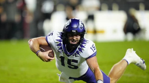 Sep 2, 2022; Boulder, Colorado, USA; TCU Horned Frogs quarterback Max Duggan (15) dives with the ball in the fourth quarter against the Colorado Buffaloes at Folsom Field. Mandatory Credit: Ron Chenoy-USA TODAY Sports